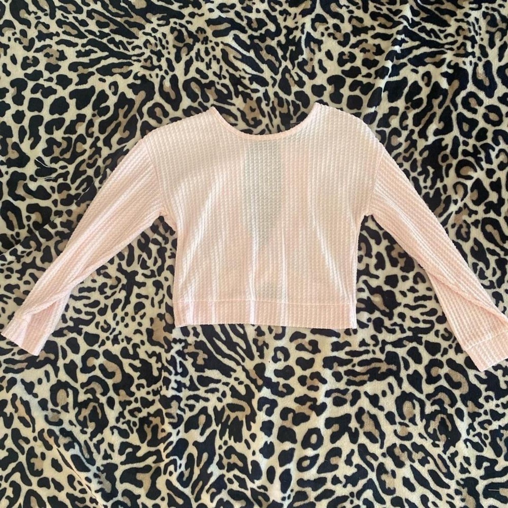 pink cropped sweater with back cutout